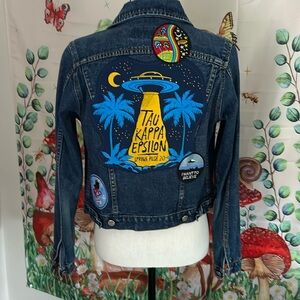 Fun upcycled jean jacket. “Out of this world”